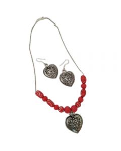 Necklace with red color beads and silver pendant 