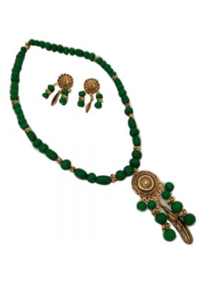 Necklace with green beads and golden pendant 